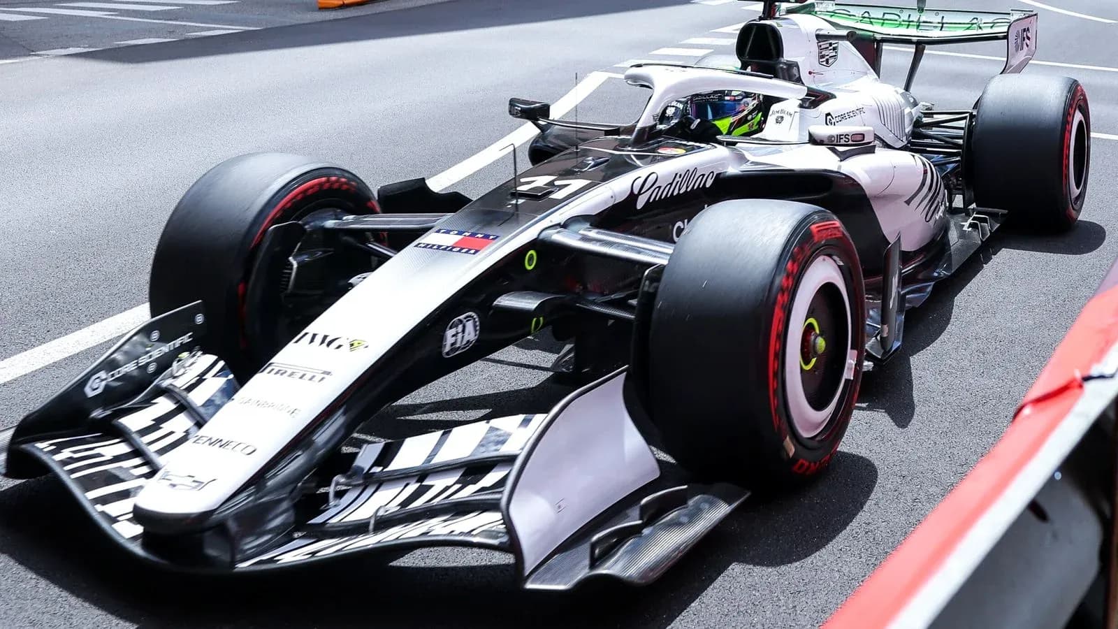 Formula 1 car on track during race event Formula 1 car on track during race event