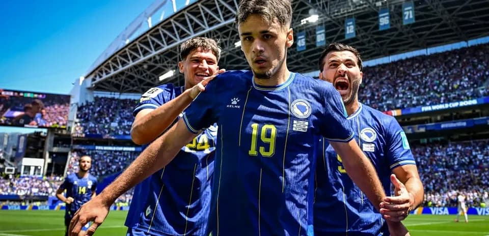 Bosnia players celebrating after a goal in match