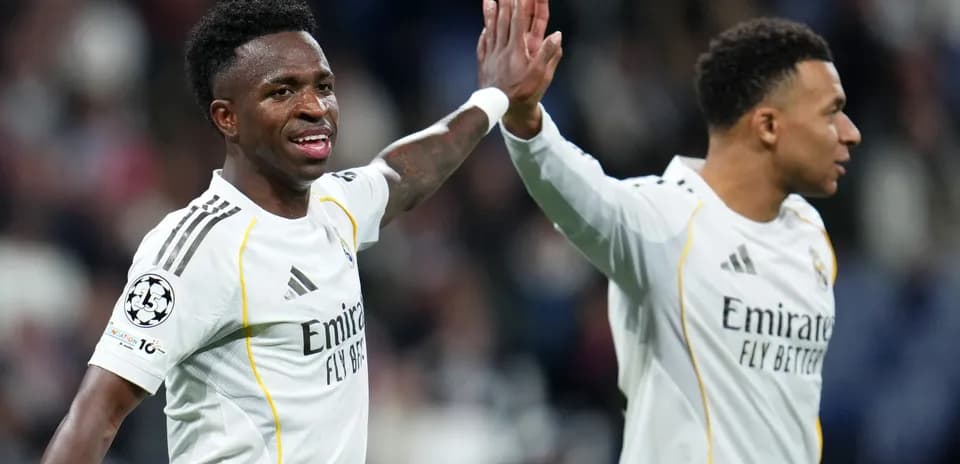 Vinicius Jr. and teammate celebrating during match