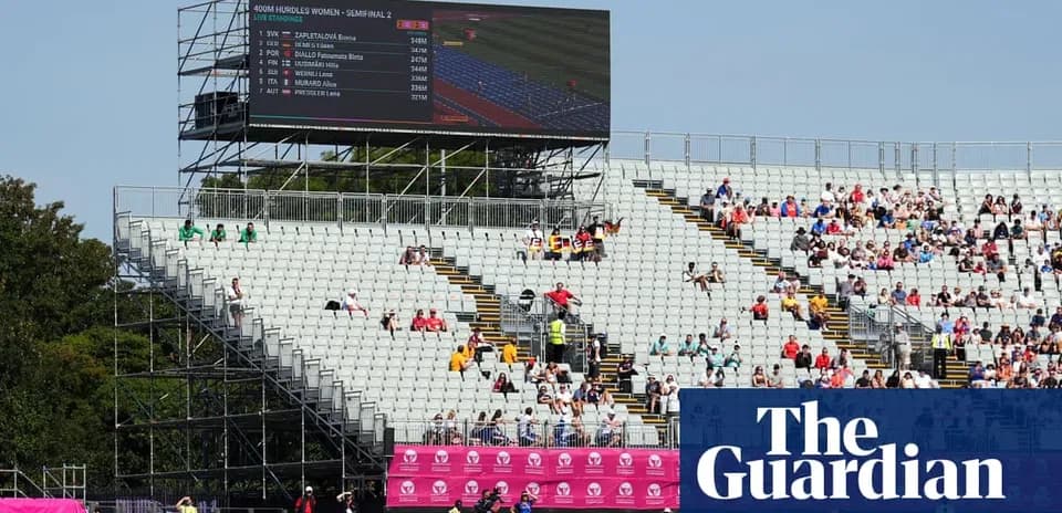 Stadium seating with scoreboard during women's 400m hurdles