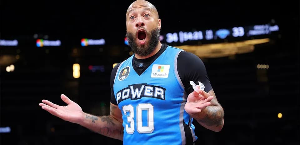 Basketball player gesturing during game action