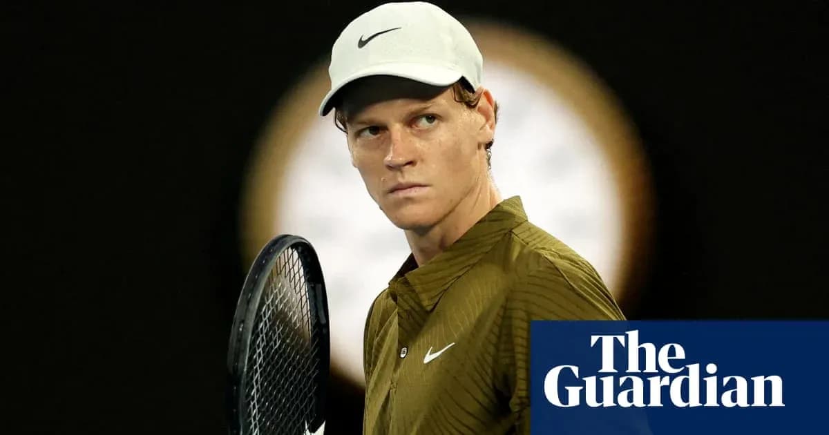 Tennis player holding racket during match