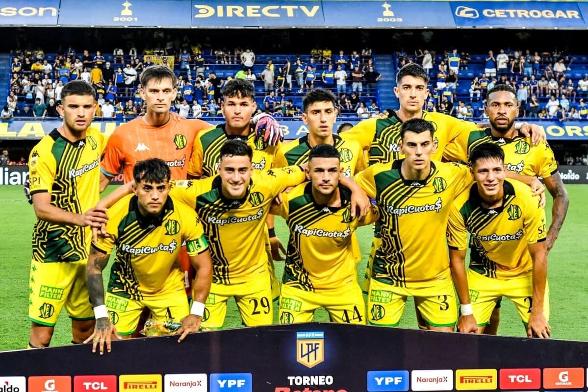 Football team posing for a group photo before match