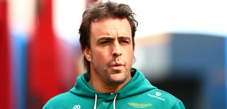F1 driver in Aston Martin team hoodie
