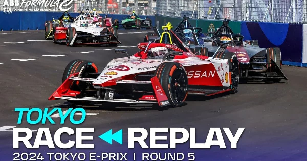 Formula E cars racing at 2024 Tokyo E-Prix Formula E cars racing at 2024 Tokyo E-Prix