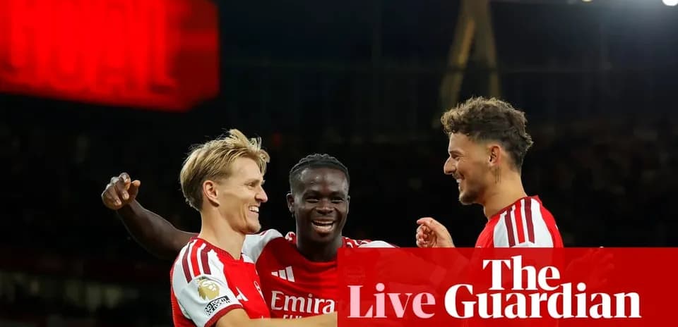 Arsenal players celebrating a goal together