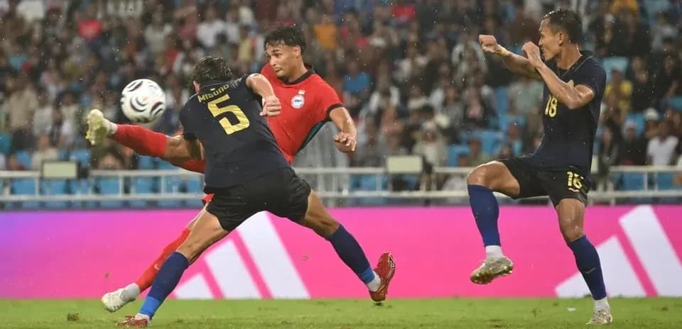 Player attempting to pass the ball during match