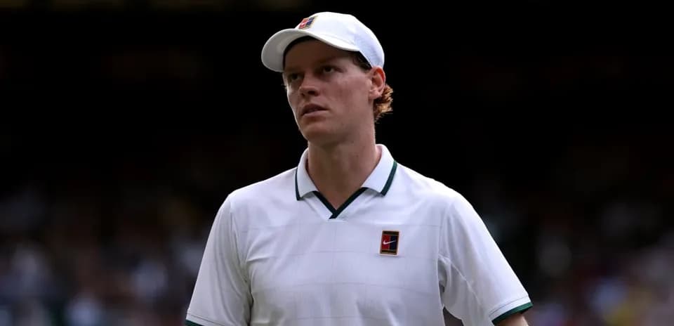 Tennis player walking off court at Wimbledon
