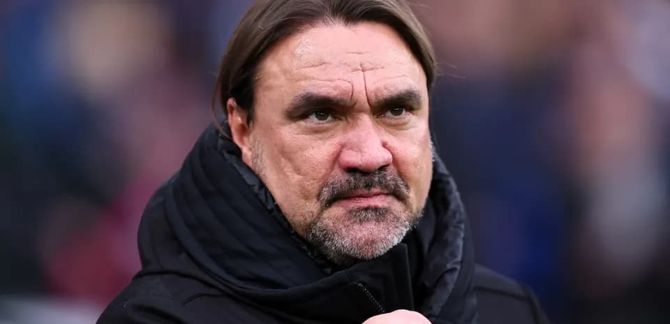 Football manager looking serious on the sidelines