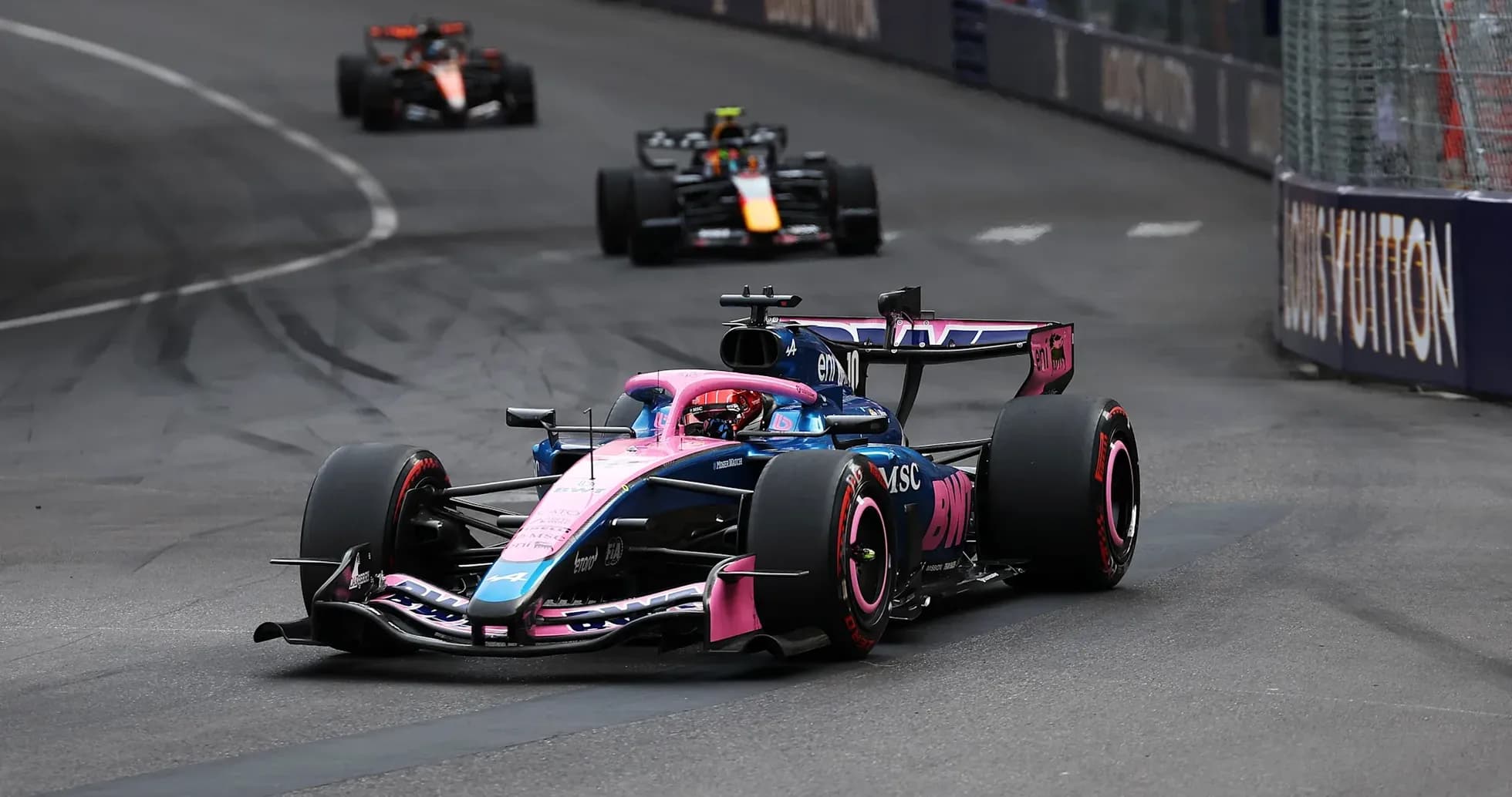 Formula 1 car racing on street circuit track