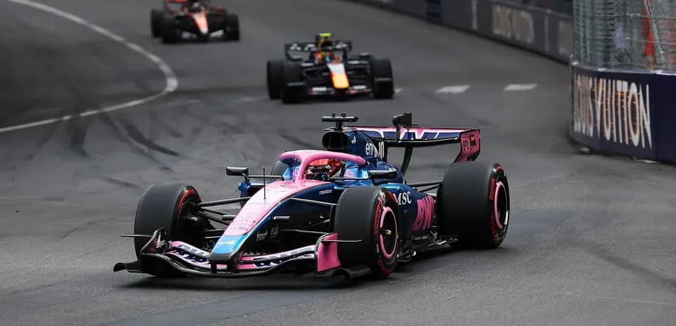 Formula 1 car racing on street circuit track