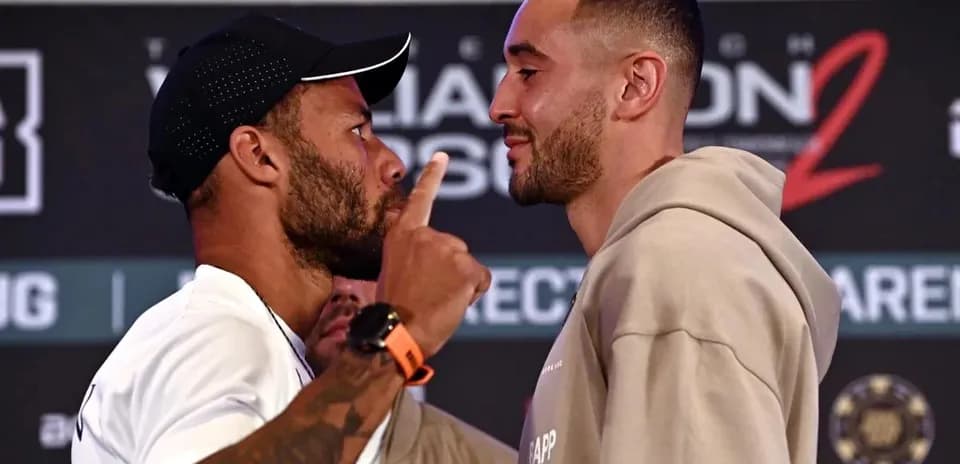 Two boxers facing off during press conference stare down