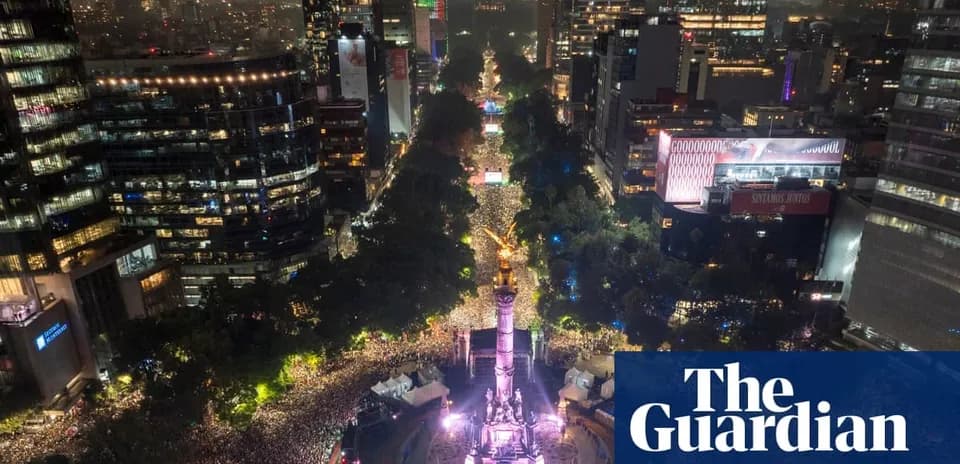 Crowd gathered at night in urban setting