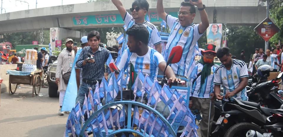 Fans celebrating with flags in street parade