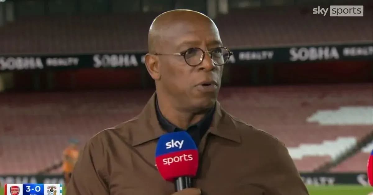 Analyst speaking on Sky Sports at stadium