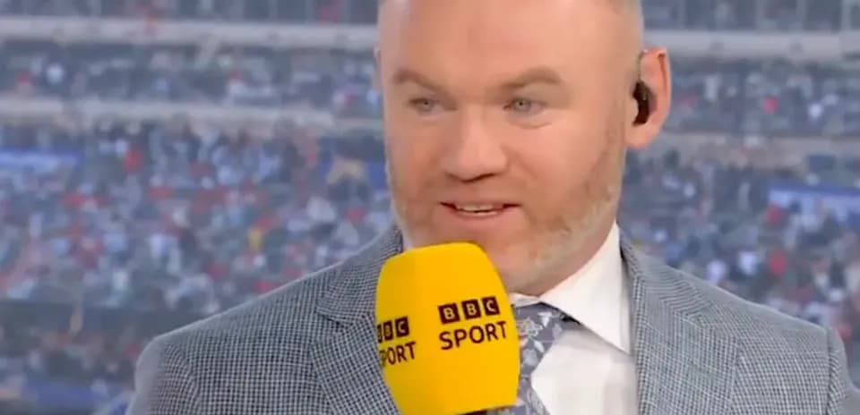 Sport commentator speaking with microphone in studio