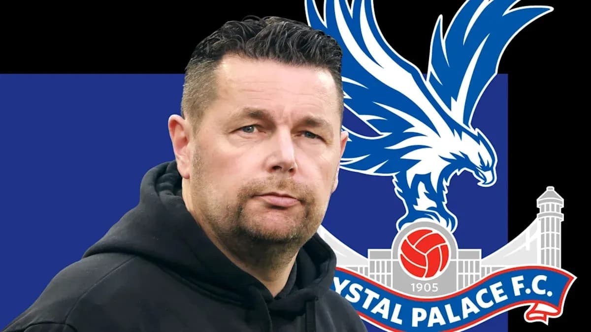 Men's football coach with Crystal Palace logo background