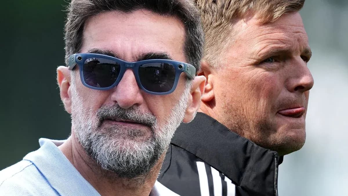 Two football coaches during a training session