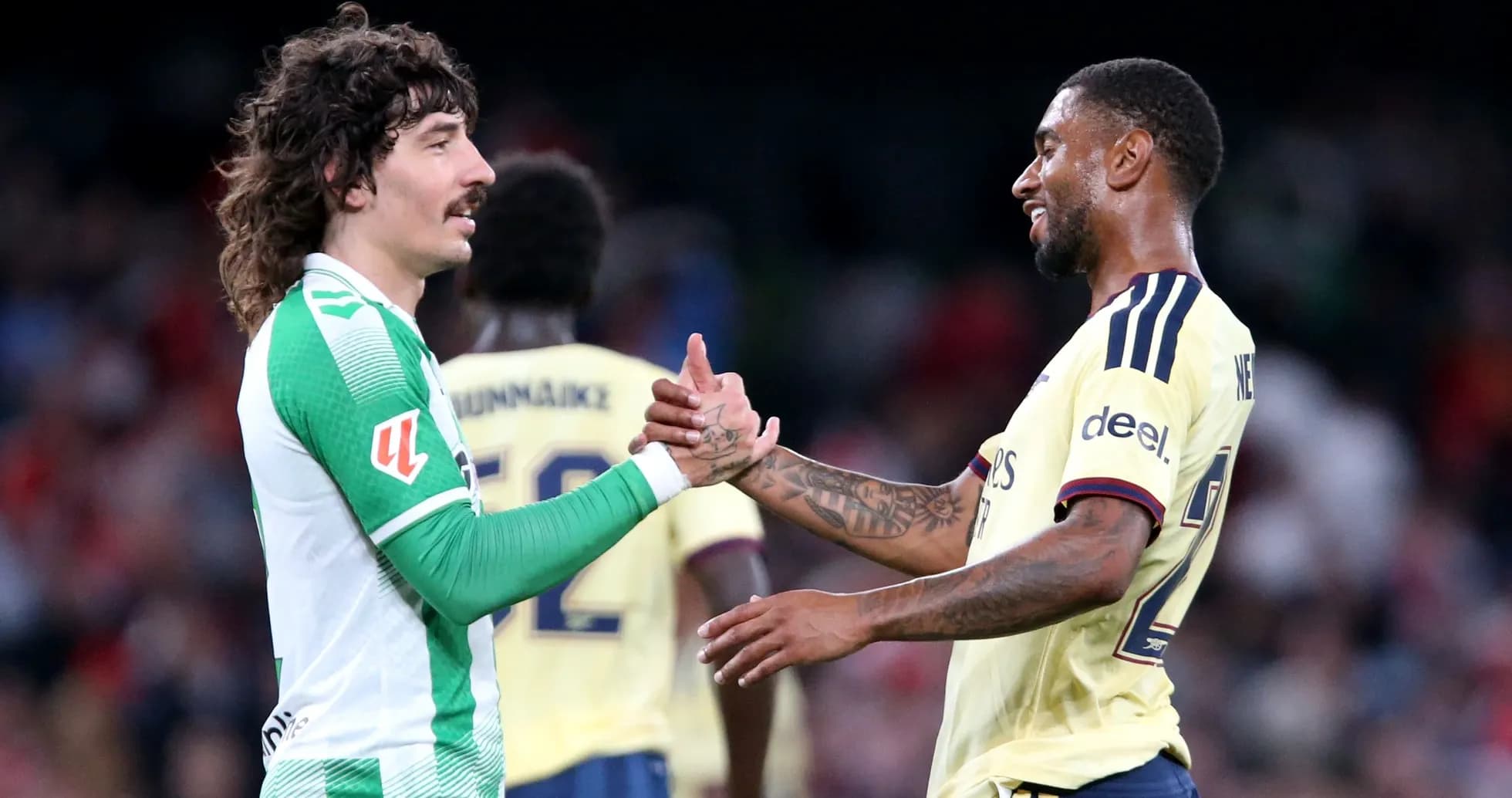 Two players shaking hands after a match