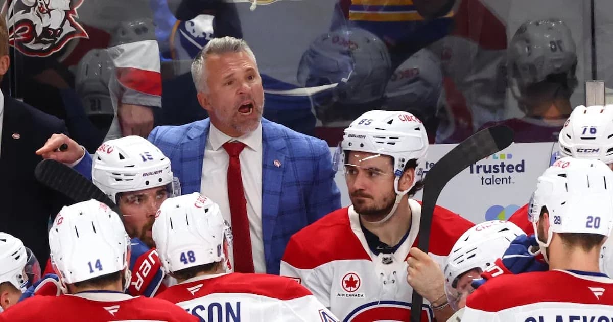 Hockey coach instructing players during timeout
