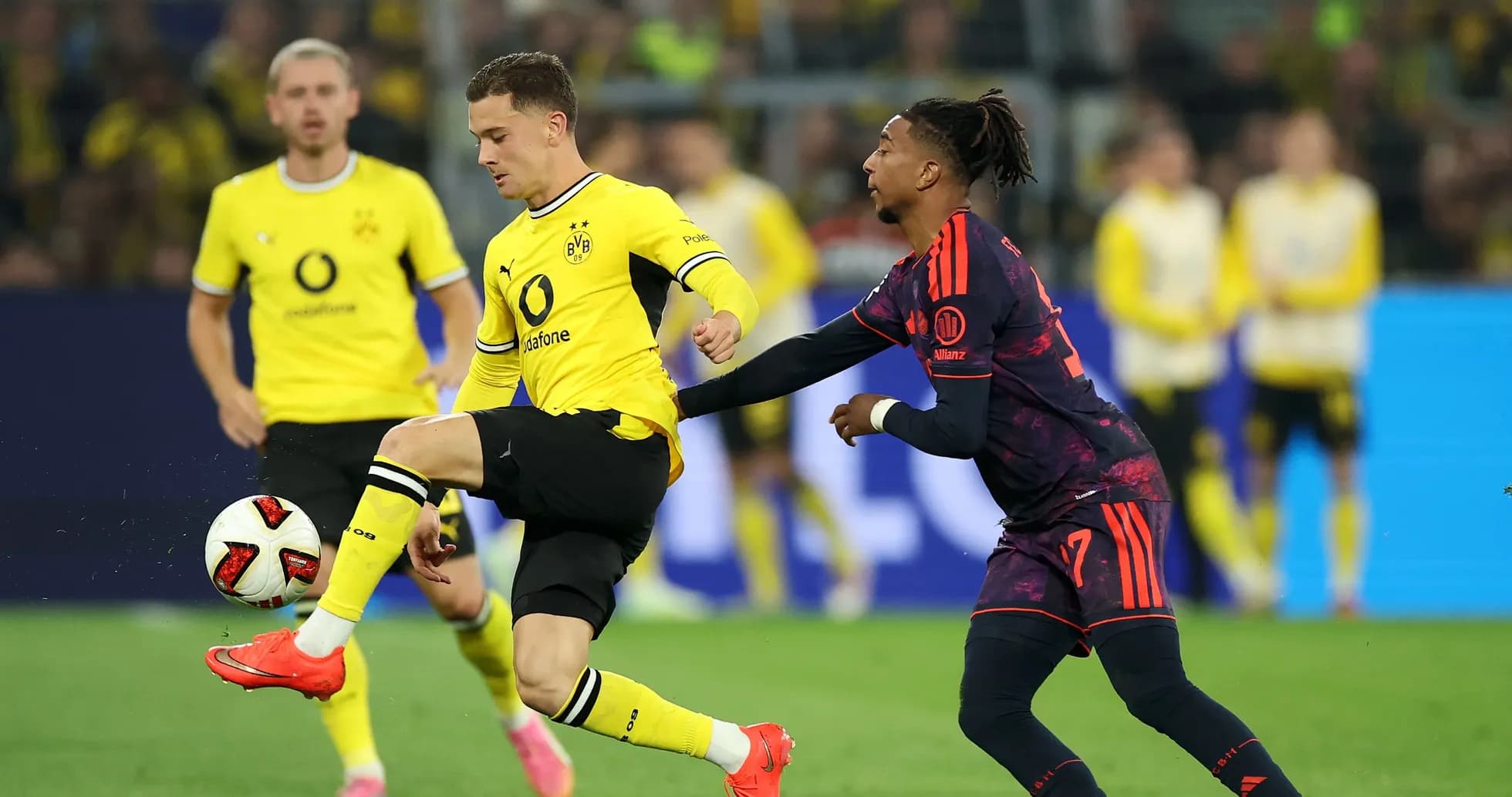 Borussia Dortmund player controlling ball during match