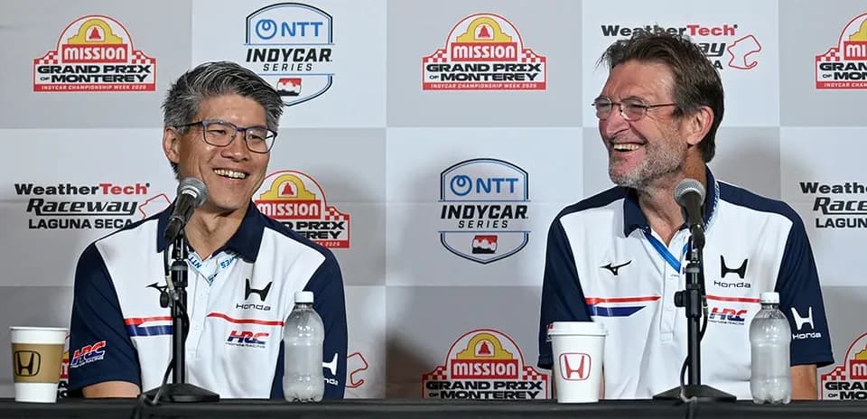 Two men speaking at IndyCar press conference