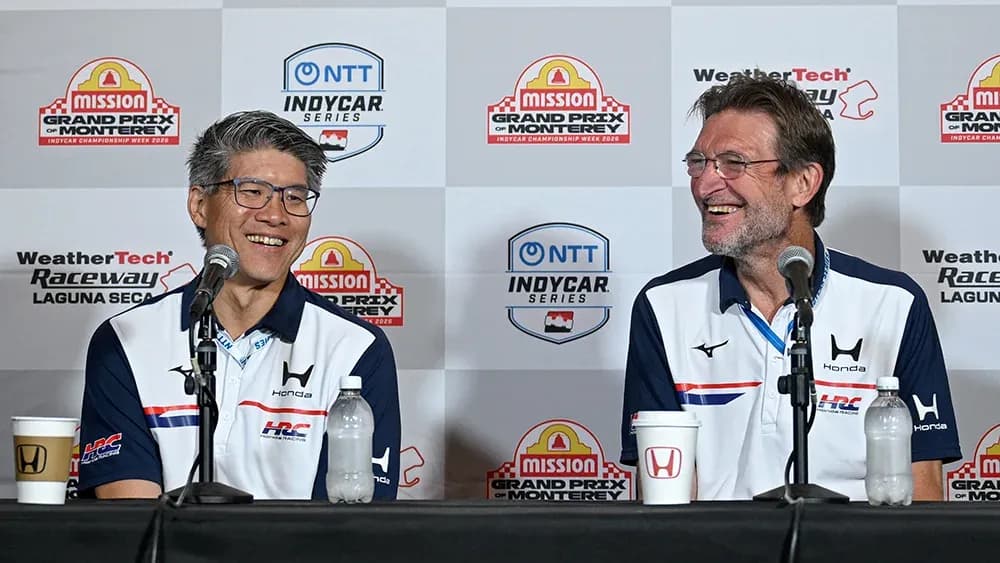 Two men speaking at IndyCar press conference