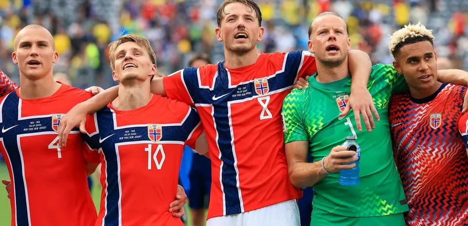 Norwegian football players celebrating after a match