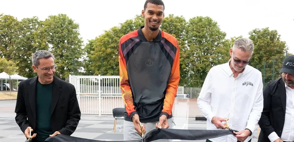 Ceremony for opening a basketball court with officials