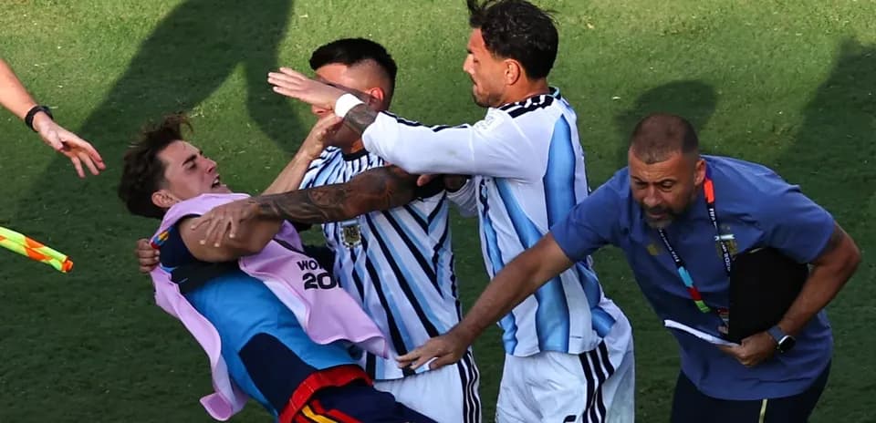 Players celebrating on the field after match