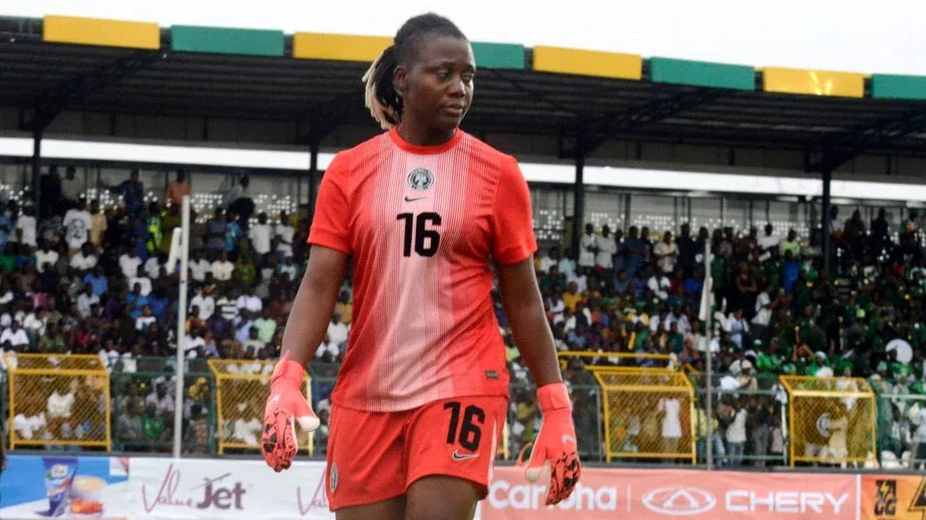 Goalkeeper walking on the pitch during match