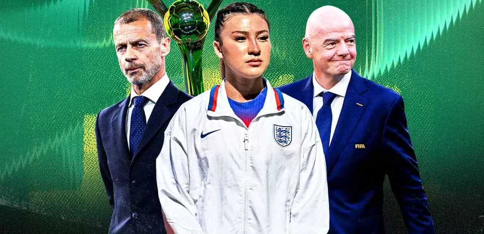 UEFA and FIFA officials with female player and trophy