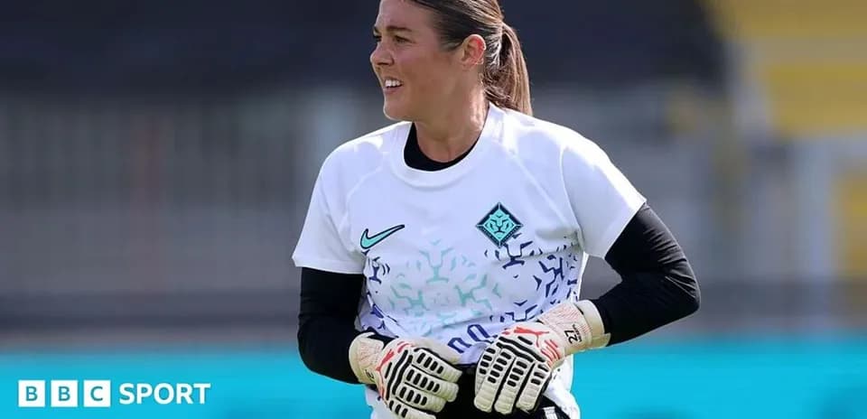 Goalkeeper training in white jersey during session