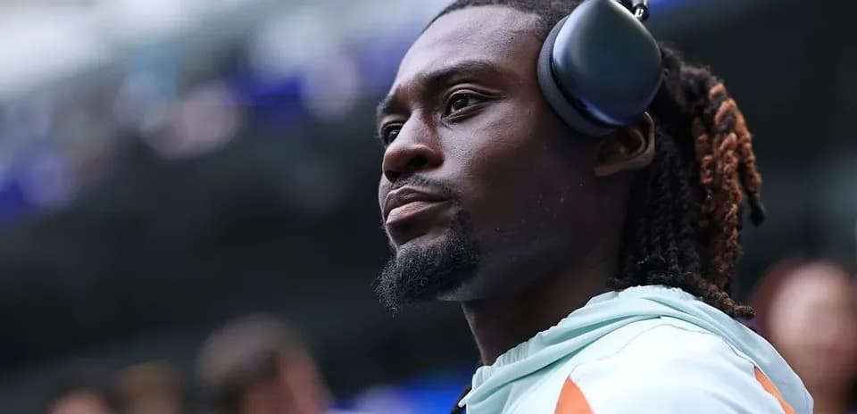 Athlete wearing headphones before the match