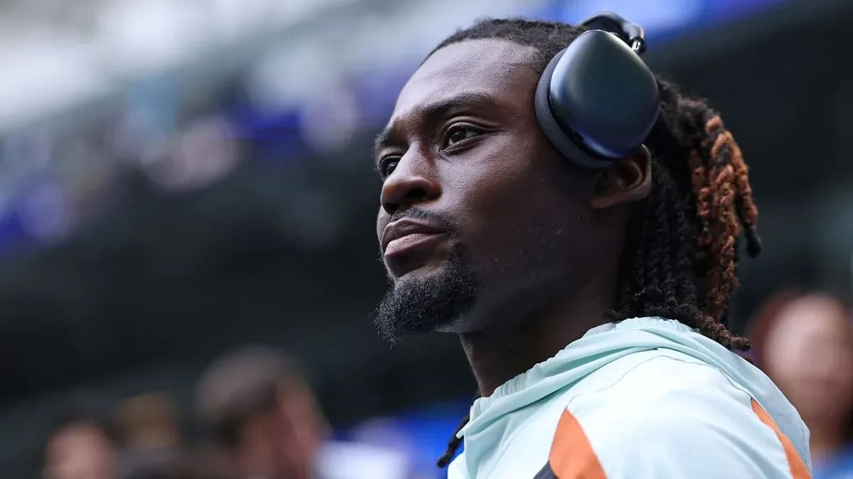 Athlete wearing headphones before the match