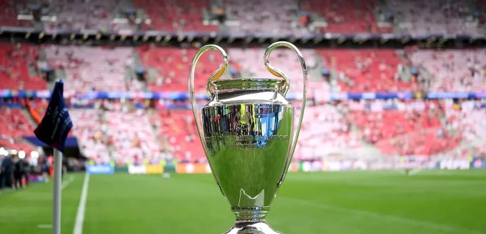 Champions League trophy on the pitch before match