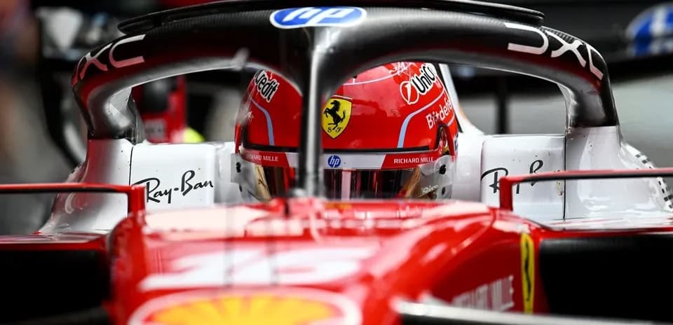 F1 driver in Ferrari car during race
