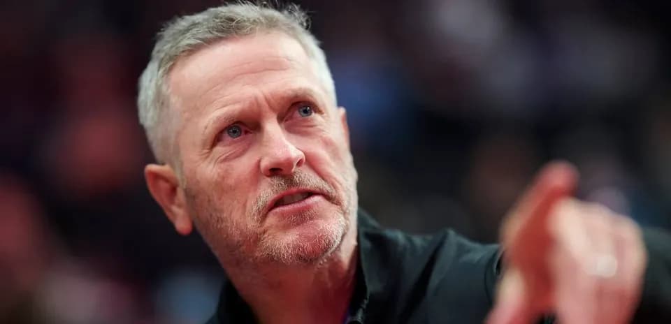Coach gesturing during a sporting event