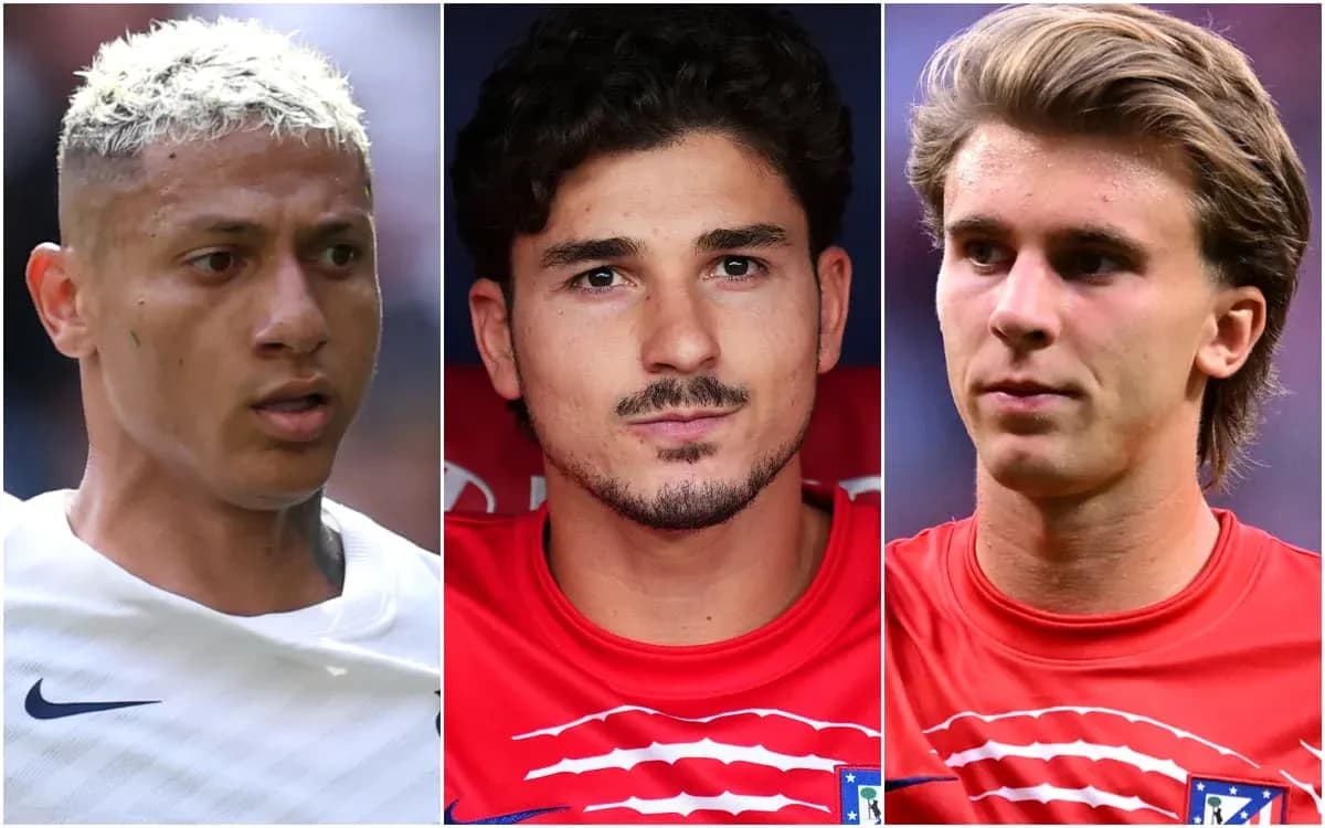 Three football players in national team jerseys