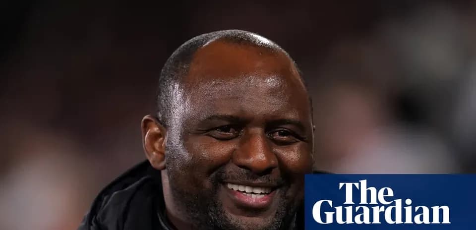 Coach smiling during match at the stadium