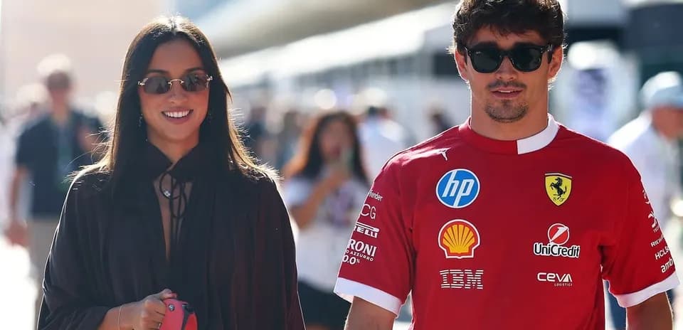 Couple walking together at a racing event