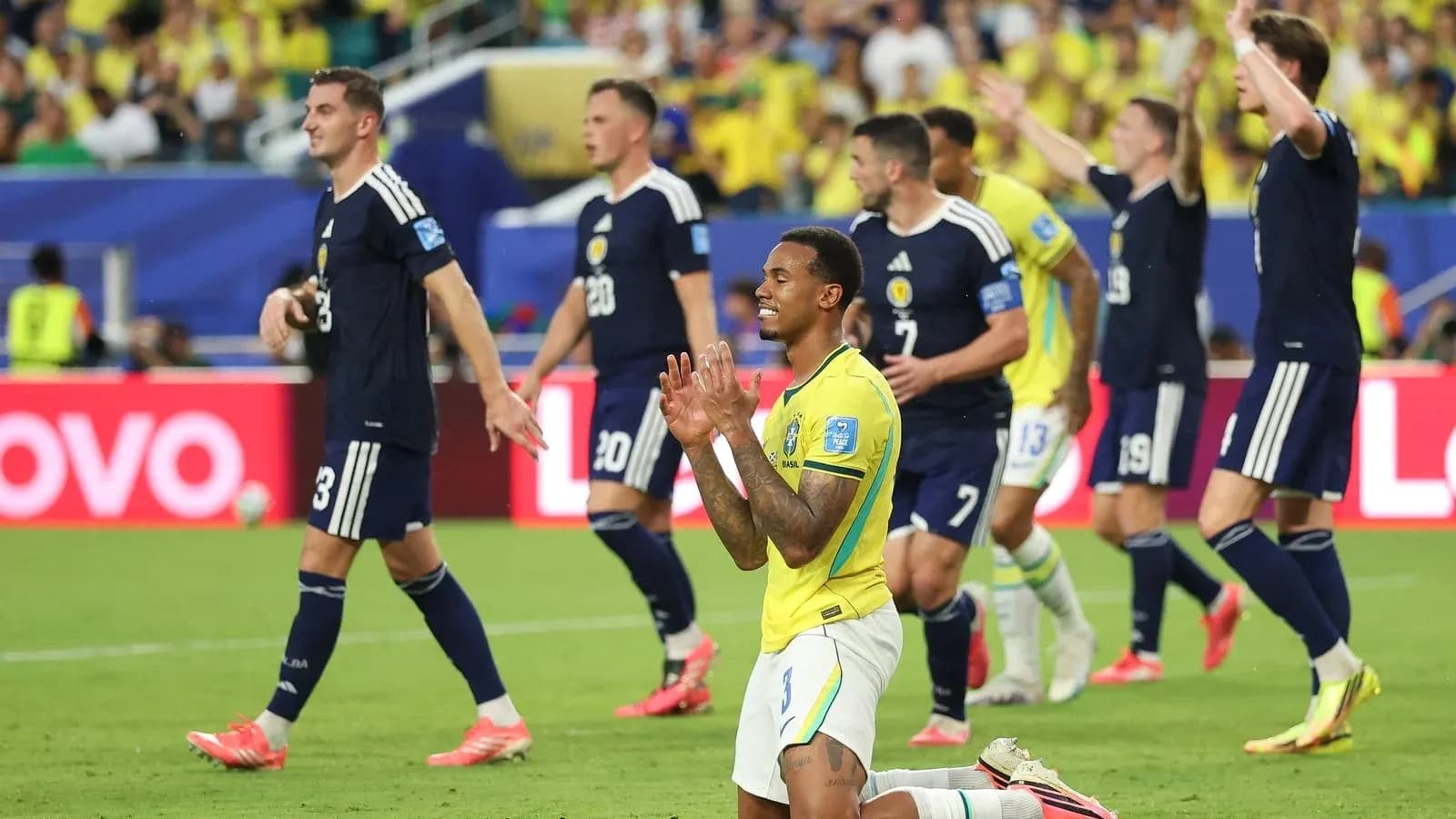 Brazil and Scotland players during a football match