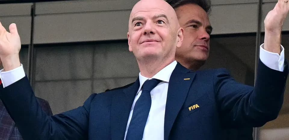 FIFA official gesturing during an event