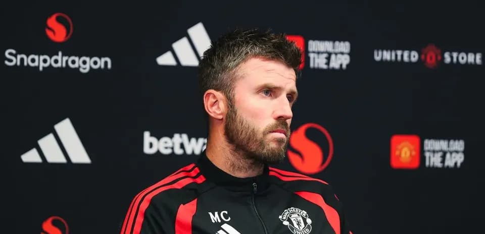 Manchester United manager at press conference podium