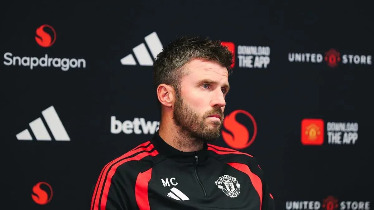 Manchester United manager at press conference podium