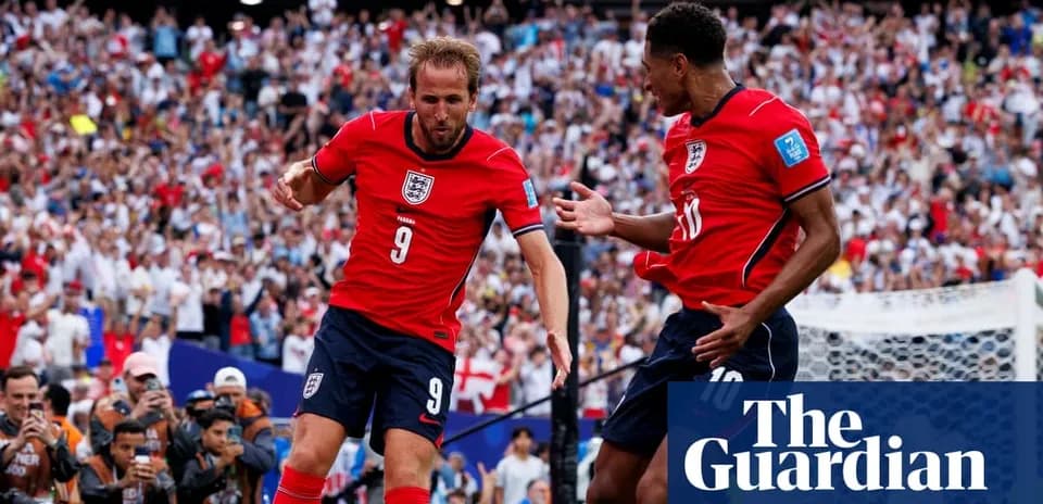 Harry Kane celebrating goal with teammate during match
