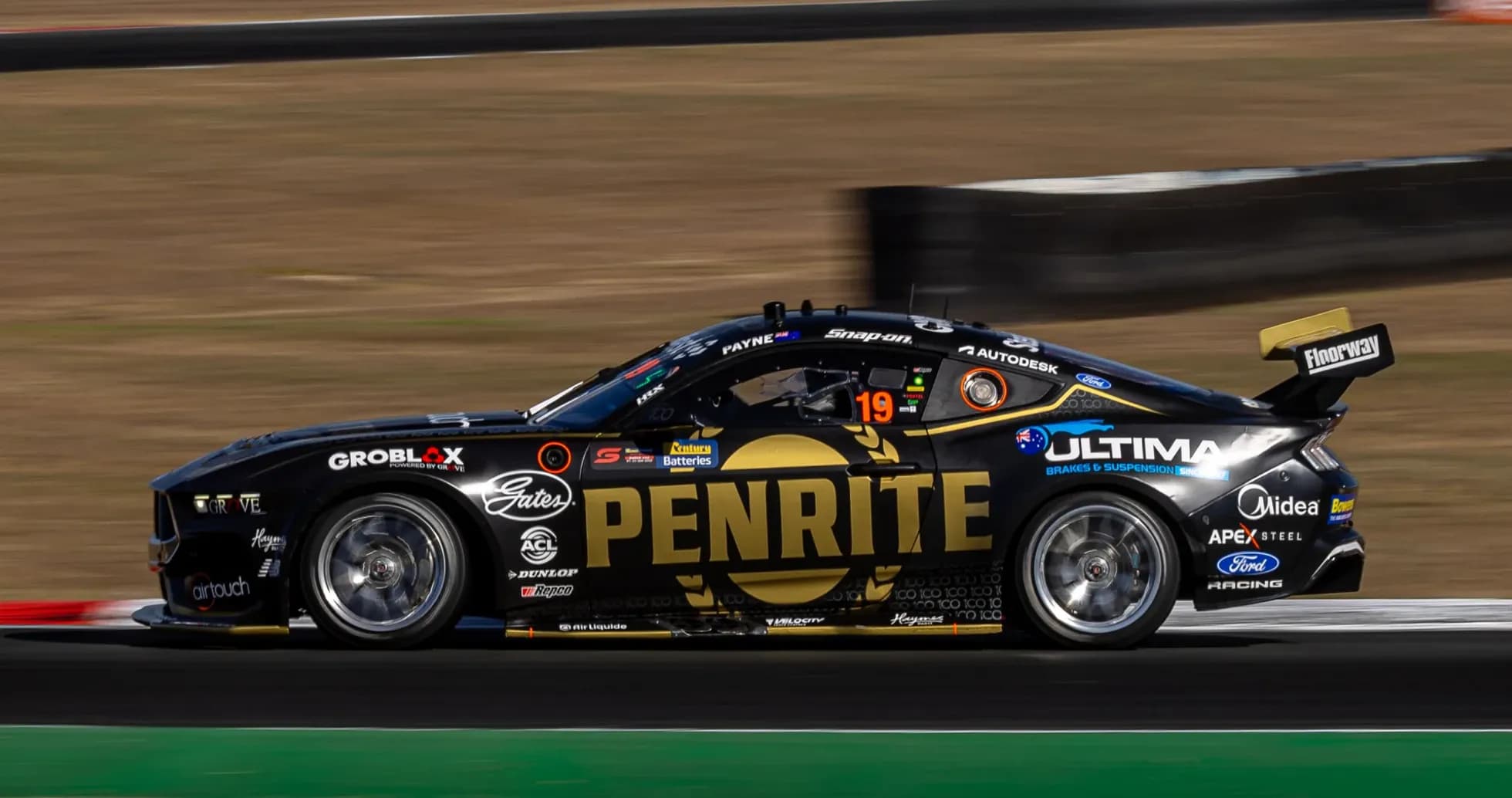 Racing car number 19 on track during event