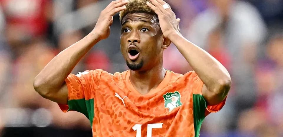 Ivorian player showing frustration during match