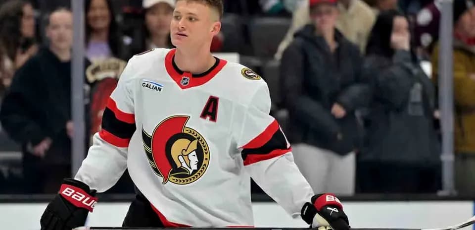 Hockey player in Ottawa Senators jersey on ice