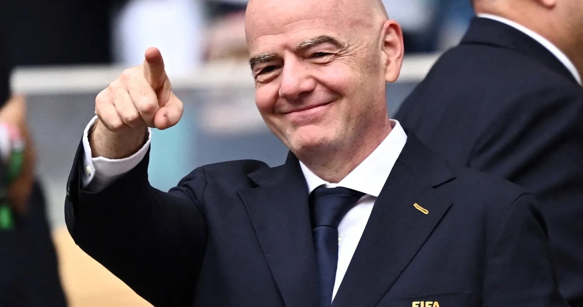 FIFA official gesturing during an event